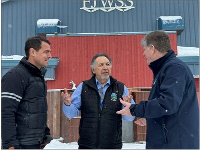 Lawrence Martin, Director of Mushkegowuk Council's Lands & Resources Department, centre, speaks with MP Adam van Koeverden, parliamentary secretary to the Minister of Environment and Climate Change Canada, left, and Ron Hallman, President and Chief Executive Officer of Parks Canada, at Francis J. Wesley Secondary School in Kashechewan First Nation where an announcement was made on Wednesday, Feb. 21 concerning a proposed national marine conservation area in western James Bay and southwestern Hudson Bay. (CNW Group/Parks Canada)