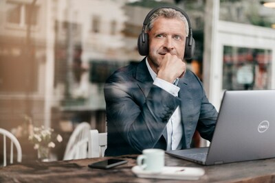 Man on a call with Dell Premier Wireless ANC Headset (WL7024)