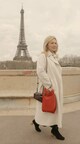 Irina Titova-Kashan, Founder of Sattaché, pictured with The Classic Bag in Rouge.