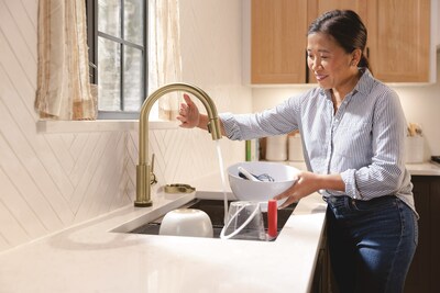 Delta Faucet debuts Touch2O®with Touchless™ Technology designed to make multi-tasking in the kitchen easier.