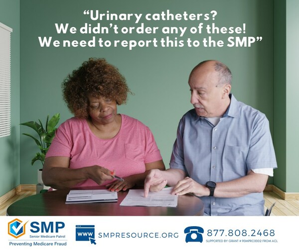 Two people sitting at a table looking at Medicare statements