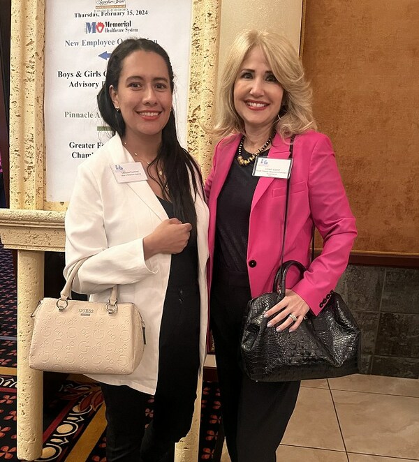 Blue Interactive Agency's Melissa Ramirez (left) and Liliam Lopez, president and founder of the South Florida Hispanic Chamber of Commerce, at a recent networking event in Fort Lauderdale.