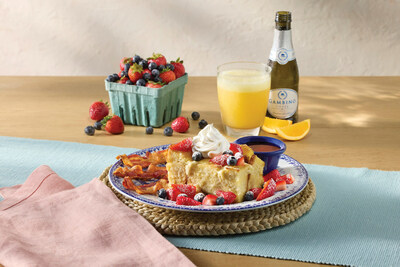 New Fresh Berry French Toast Bake includes thick-cut country bread soaked in vanilla custard, topped with cheesecake filling, baked 'til golden and topped with fresh strawberries, fresh blueberries, whipped cream and powdered sugar. Served with strawberry syrup and choice of bacon or sausage.