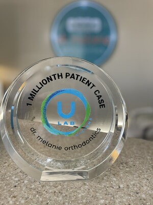 Dr. Melanie's award for being the submitter of the 1 Millionth case for uLab