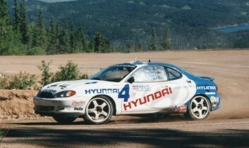 1997 ? Paul Choiniere won the Pikes Peak Open division in a 1997 Hyundai Tiburon in 11:56.79.