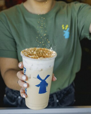 The Shamrock Kicker features a mix of Irish cream syrup, espresso and half and half, topped with Soft Top and gold sprinks.