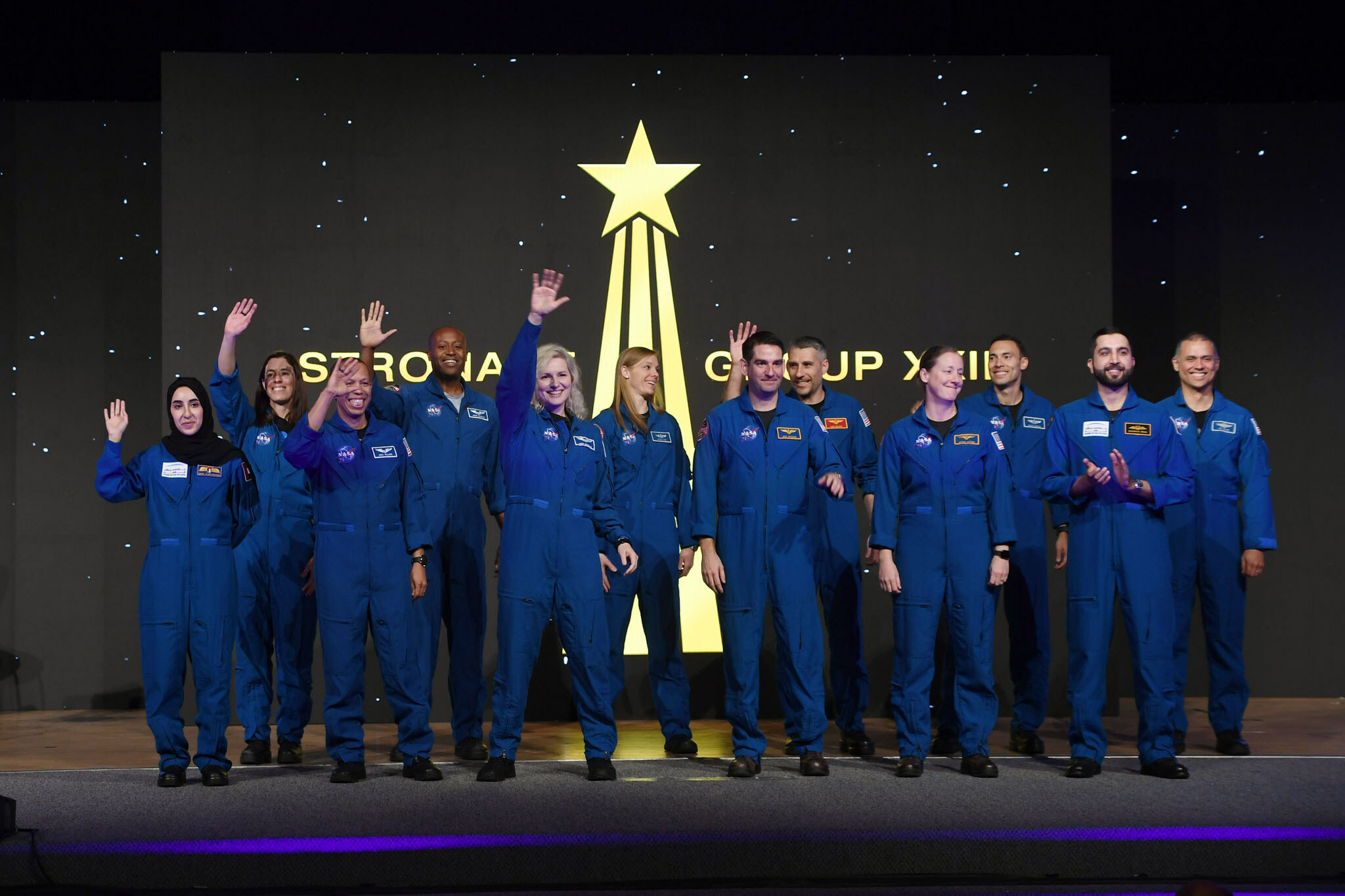 NASA's newest class of astronauts pose for a photo during their graduation ceremony on March 5, 2024, at the Johnson Space Center in Houston.