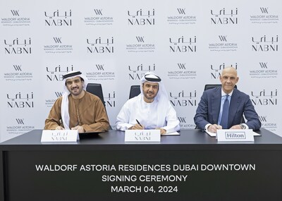 Signing of Waldorf Astoria Residences Dubai Downtown - (Left to Right) Abdulrahman Alsuwaidi, co-founder and chairman of NABNI Developments; Badr Alsuwaidi, co-founder and CEO of NABNI Developments; and Daniel Wakeling, vice president of development, luxury & residential ? Europe and Africa, Hilton