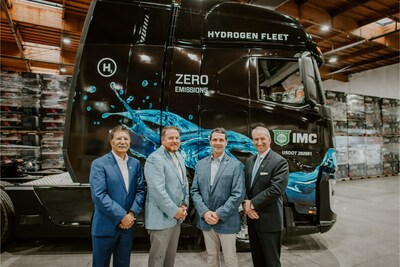 Standing in front of IMC's hydrogen truck are Mario Cordero, Chief Executive Officer, Port of Long Beach, Jim Gillis, IMC Pacific Region President, Joel Henry, IMC Chief Executive Officer, and Eugene (Gene) D. Seroka, Executive Director, Port of Los Angeles & Chief Logistics Officer, City of Los Angeles.