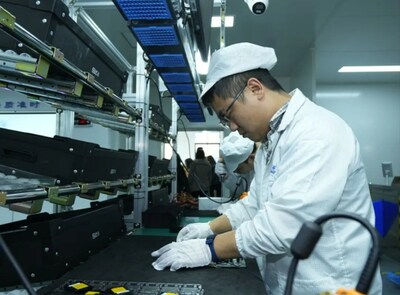 An employee works at an intelligent manufacturing base in Guiyang. [Photo/Guiyang news network]