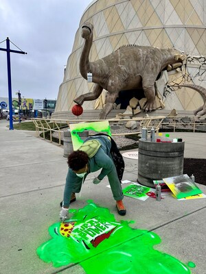 Visiting Artist Ess McKee sets the shell shock green tone with her creativity outside The Children's Museum of Indianapolis