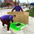 Team Donatello represents for the Teenage Mutant Ninja Turtles exhibit by helping to paint the town green