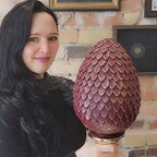 $1000 Chocolate Dragon Egg held by Sam Lapointe, master creator at The Grand Order of Divine Sweets