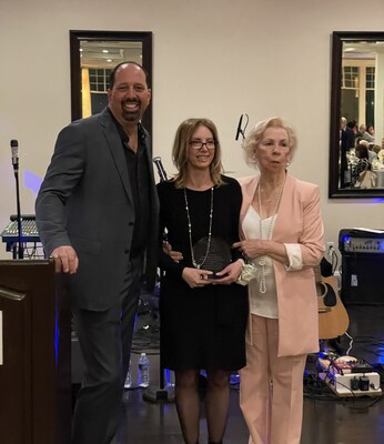 Whisper Woods executive director, Desiree Krajnyak-Baker, receives Kings Park Chamber of Commerce Humanitarian of the Year award