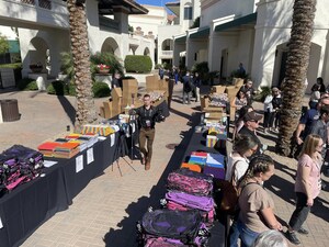 N-Hance, BELFOR Franchise Group franchisees fill backpacks for Feed the Children's Backpack-N-Go event at annual convention