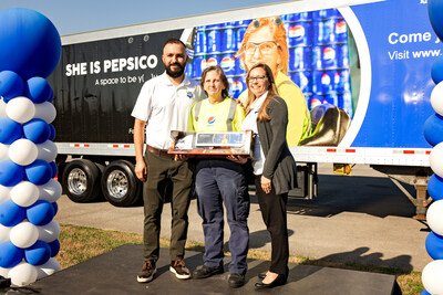 Kathy Marks, Knoxville resident and frontline employee at PepsiCo Beverages North America, Plant Director Carlos Rivera, and Senior Director of Manufacturing, Nikki Walker, at the "She Is PepsiCo" ceremony spotlighting women in frontline roles on Wednesday, March 13, 2024 in Knoxville, TN.