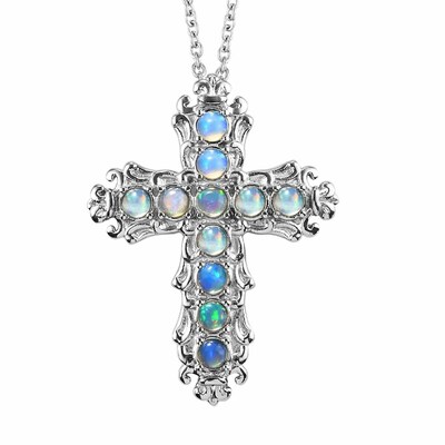 Welo Opal cross pendant necklace.
