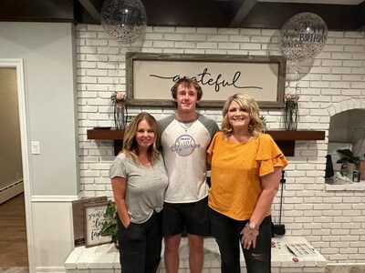 Staci Swiderski (left), her son born through surrogacy, and their surrogate (right).
