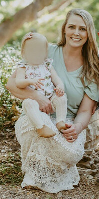 Parents of a 23-month-old girl are suing Park Vista Children's Academy in Keller, alleging caregivers mistreated their daughter and used inappropriate discipline tactics at the daycare center in August 2023. Per the complaint, Brooke Napier's daughter (pictured), along with other classmates, were victims of abusive behavior including pushing, shoving, and aggressive handling such as being yanked by one arm. Daycare injury attorney Russell Button of The Button Law Firm represents the family.