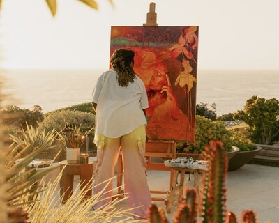 Art House San Clemente Artist paints their work in outdoor space overlooking the ocean.