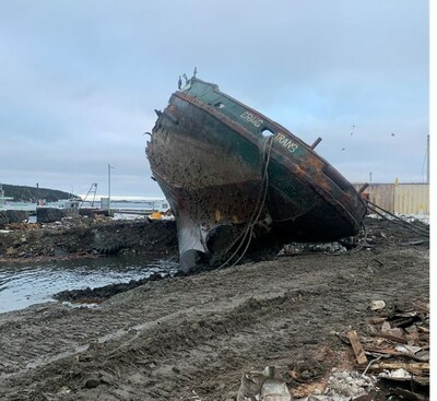 Tug Craig Trans on its side in Marie Joseph, Nova Scotia. (CNW Group/Canadian Coast Guard)