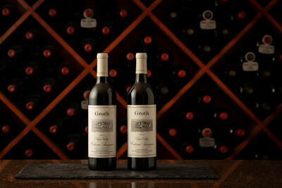 The 40th vintage of Oakville Cabernet with commemorative label, next to the 1982 vintage bottle.