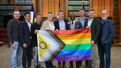 Members of the Gay Games Denver 2030 Bid Committee with Denver Mayor Johnston and Council Member Watson