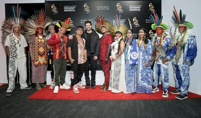 DJ Alok and Brazilian Indigenous artists backstage at the Grammy museum