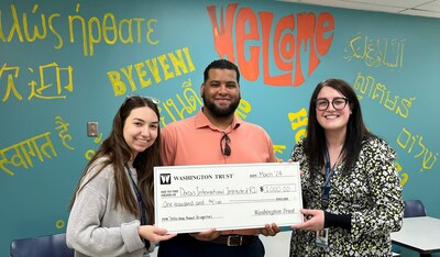 Washington Trust made a <money>$1,000</money> donation to Dorcas International Institute of RI on behalf of Louis Arias, in recognition of his recent employee award. Pictured from L to R: Paige Jones, Case Manager at Dorcas International Institute of RI; Louis Arias, Flex Banker at the future Washington Trust Olneyville Branch; and Emily Crandall, Donor Relations & Volunteer Services Manager at Dorcas International Institute of RI.