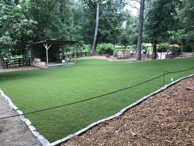 Artificial turf installation in Milton, GA at Painted Horse Winery by Southern Turf Co.