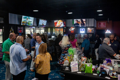 Attendees Networking on March 26th, 2024. Photo Credit: Alex Favero