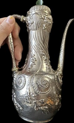 Tiffany 1879 Charles Osborne designed Aesthetic Movement Sterling Silver after dinner coffee pot. Image courtesy of Woodcliff on the Hudson