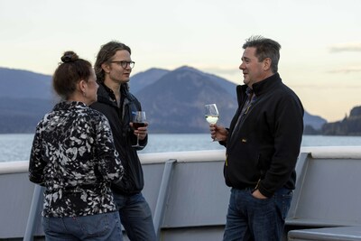 FOOD & WINE Executive Wine Editor Ray Isle mingles with guests on the bow of National Geographic Sea Bird. (Photo Credit Chelsea Mayer, Lindblad Expeditions)