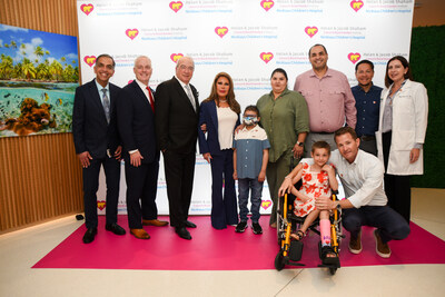 Nicklaus Children’s Hospital physicians, patients and patient families pose for a photo with Helen and Jacob Shaham, South Florida philanthropists, after their gift announcement of $15 million to benefit pediatric cancer care and research. In their honor, the institute was named the Helen & Jacob Shaham Cancer & Blood Disorders Institute April 3, 2024, in Miami at Nicklaus Children’s Hospital.  L to R: Ziad Khatib, MD, Matthew A. Love, President and CEO of Nicklaus Children's Health System, Jacob and Helen Shaham, South Florida philanthropists, Olivia and Matt Cappiello, George and Zuleira Butros, Ossama Maher, MD, Jorge Galvez Silva, MD, Maggie Fader, MD.