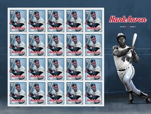 USPS Unveils Henry "Hank" Aaron Stamp On 50th Anniversary of Eclipsing Homerun Record