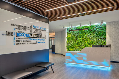 The fusion of nature and corporate branding in an office entrance, where first impressions are rooted in beauty, health, wellness and sustainability.