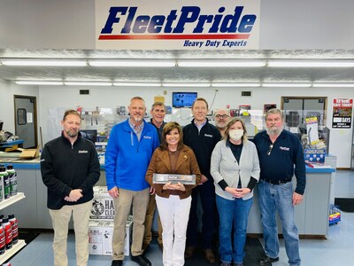 U.S. Representative Diana Harshbarger of Tennessee (front row, center) poses with FleetPride general counsel Baron Oursler (back row, in black jacket) and other employees at a FleetPride location in Kingsport, TN.