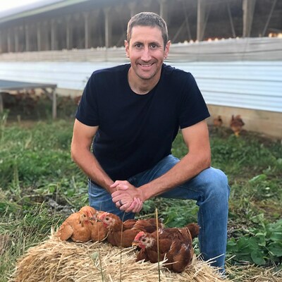 Founder of LaBelle Patrimoine, Mike Charles, with his heritage chickens in Lancaster, PA.