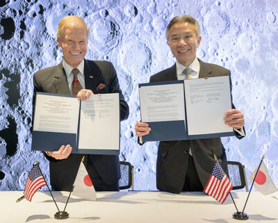 NASA Administrator Bill Nelson, left, and Japan’s Minister of Education, Culture, Sports, Science and Technology Masahito Moriyama, hold signed copies of an historic agreement between the United States and Japan to advance sustainable human exploration of the Moon, Tuesday, April 9, 2024, at the NASA Headquarters Mary W. Jackson Building in Washington. Under the agreement, Japan will design, develop, and operate a pressurized rover for crewed and uncrewed exploration on the Moon. NASA will provide the launch and delivery of the rover to the Moon as well as two Japanese astronaut missions to the lunar surface. Photo Credit: (NASA/Bill Ingalls)
