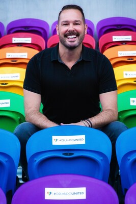 image of author Dr Steve Yacovelli at the 49 seats in the Orlando City Soccer Stadium dedicated to the Pulse shooting victims
