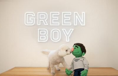 Bean the Green Boy Mascot and his friend Junior celebrating the opening of Green Boy Groups Pet Food Division