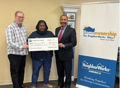 Washington Trust presented NeighborWorks Blackstone River Valley with a <money>$22,000</money> grant to support their 'Focused Neighborhood Homeownership Initiative." From L to R: Joseph Garlick, Executive Director at NeighborWorks Blackstone River Valley, Daynah Williams, Director of HomeOwnership & Asset Building at NeighborWorks Blackstone River Valley, and Rolando Lora, Executive Vice President, Chief Retail Lending Officer and Director of Community Lending at Washington Trust.