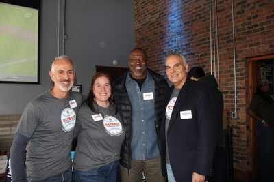 Members of the AmeriCare Medical Team with Detroit Lions alumnus, Lomas Brown, at their annual Detroit Tigers Opening Day event for the healthcare community.