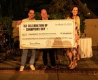 ISE Board members, Martin Martino, MD and John R. Porterfield, MD present a $155,555 donation to drive change in women’s cancer to Ginger J. Gardner, MD, Chair of the Foundation for Women’s Cancer