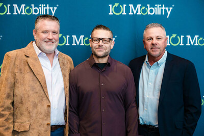 Michel Ragland (center) is awarded the prestigious Royce Barnhardt Excellence Award, joined by 101 Mobility co-founders Luke Sampson (left) and Keith Barnhardt (right).