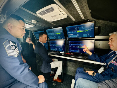 USSF Guardians get a first look at the SCAR system's backend mission services inside the BlueHalo mobile command center during Space Symposium 2024 in Colorado Springs, CO.