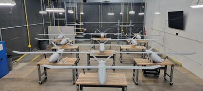 RapidFlight's additive manufacturing enables production of thousands of systems that meet replicator requirements. Nine E2 aircraft are displayed here on the production line and can be seen at XPONENTIAL 2024, booth 4707.