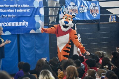 Tony the Tiger celebrates with Springfield Middle School students this morning. Battle Creek Public Schools recently received $50,000 from WK Kellogg Co and Meijer through Kellogg's Frosted Flakes Mission Tiger™, supporting more than 350 middle school students who play sports at Battle Creek Public Schools.