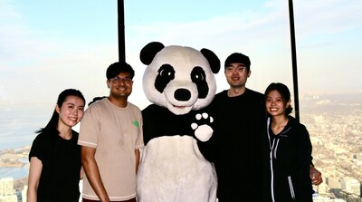 Taking in the view with panda after climbing to the top of the CN Tower. (CNW Group/World Wildlife Fund Canada)