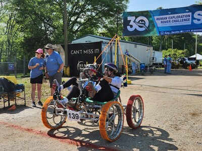 Students from Universidad Catlica Boliviana prepare to traverse the course at the 2024 Human Exploration Rover Challenge at the U.S. Space & Rocket Center in Huntsville, Alabama, near NASA's Marshall Space Flight Center. Credits: NASA/Taylor Goodwin